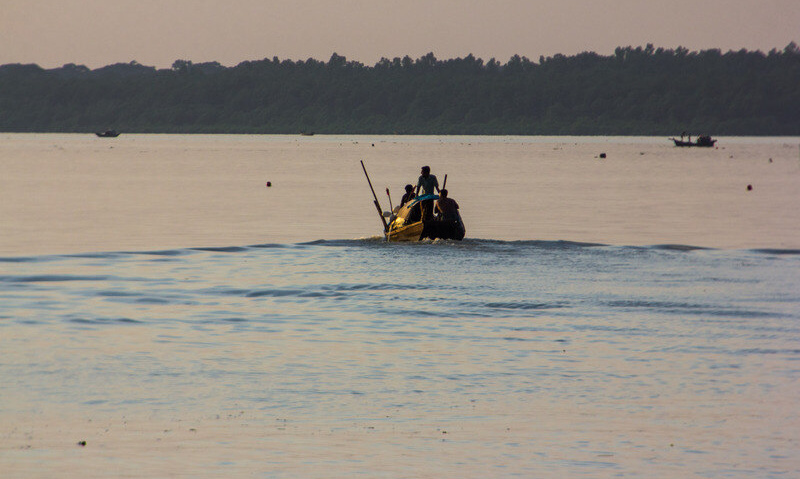 Some fishermen fishing in the rivers of Bangladesh look like vagabonds. They spend most of the day in the river in pursuit of a livelihood.